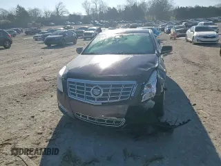 2015 Cadillac XTS Luxury z VIN 2G61M5S36F9189770, wystawiony jako Copart lot #46235475 z przebiegiem 107 451 mil mil oraz Szkoda całkowita • Salvage title. Historia ofert i sprzedaży dostępna na DreamBid. Obrazek 11.