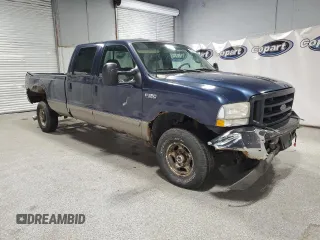 2002 Ford F-350 XL with VIN 1FTSW31F32ED59540, listed as a Copart auction lot 54148235 with 219,395 mi miles and Clean title. Bid and sale history available at DreamBid. Image 4.