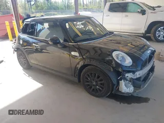 2014 MINI Hardtop S z VIN WMWXM7C5XET969925, wystawiony jako IAAI lot #42107542 z przebiegiem 59 699 mil mil oraz . Historia ofert i sprzedaży dostępna na DreamBid. Obrazek 1.