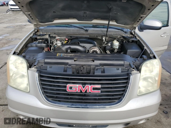 2007 GMC Yukon SLT with VIN 1GKFK130X7R106388, listed as a Copart auction lot 86125434 with 144,528 mi miles and Salvage Title. Bid and sale history available at carsss.com. Image 12.