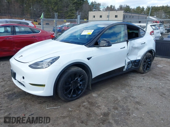 2023 Tesla Model Y Long Range with VIN 7SAYGDEE7PF832007, listed as a IAAI auction lot 41751598 with 14,126 mi miles and . Bid and sale history available at DreamBid. Image 17.