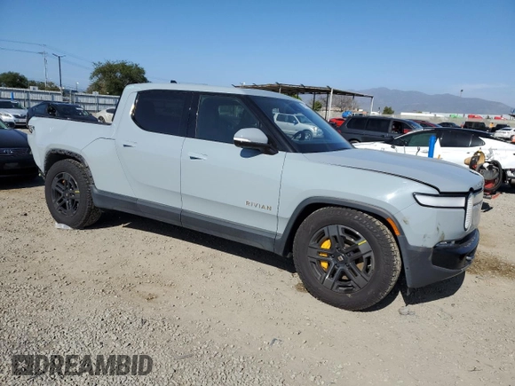 2022 Rivian R1T Adventure z VIN 7FCTGAAA0NN010103, wystawiony jako Copart lot #53312035 z przebiegiem 48 333 mil mil oraz Szkody całkowita. Historia ofert i sprzedaży dostępna na DreamBid. Obrazek 4.