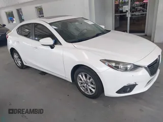 2016 Mazda 3 i Touring with VIN JM1BM1V73G1300953, listed as a IAAI auction lot 42064943 with 161,444 mi miles. Bid and sale history available at carsss.com. Image 1.