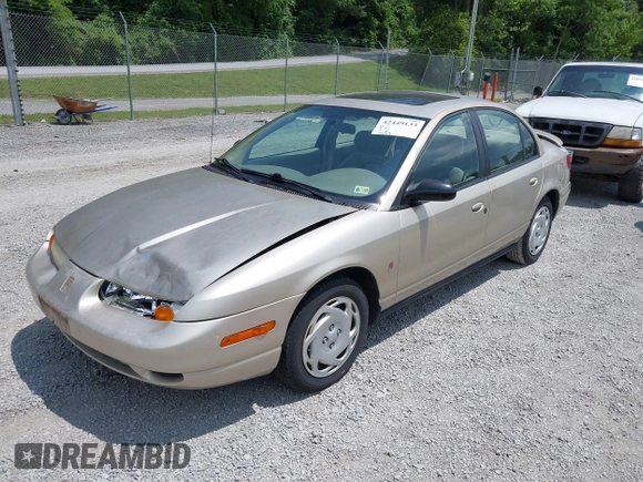 2001 Saturn SL z VIN 1G8ZK54721Z272773, wystawiony jako IAAI lot #42449133 z przebiegiem 56 714 mil mil oraz . Historia ofert i sprzedaży dostępna na DreamBid. Obrazek 2.
