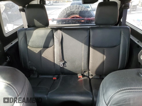 2018 Jeep Wrangler JK Unlimited Sport S with VIN 1C4BJWDG8JL812324, listed as a Copart auction lot 76595354 with 140,013 mi miles and Salvage Title. Bid and sale history available at carsss.com. Image 10.