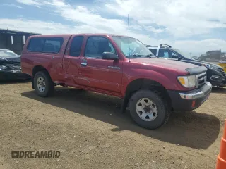 2000 Toyota Tacoma with VIN 4TAWN72N2YZ620655, listed as a Copart auction lot 60704065 with 257,636 mi miles and Salvage title. Bid and sale history available at DreamBid. Image 4.