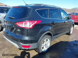 2013 Ford Escape SE with VIN 1FMCU9GX4DUD30453, listed as a IAAI auction lot 41589446 with 130,556 mi miles. Bid and sale history available at carsss.com. Image 4.