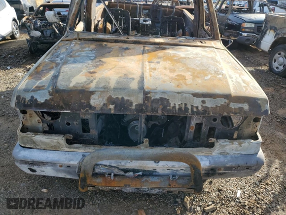 1991 Ford Bronco XL z VIN 1FMEU15N7MLA62791, wystawiony jako Copart lot #82100384 z przebiegiem Nie podano mil oraz Nie do naprawy • Non repairable. Historia ofert i sprzedaży dostępna na DreamBid. Obrazek 11.