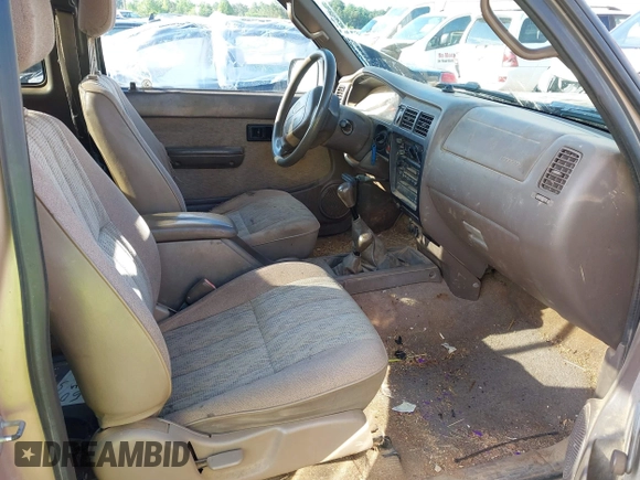 1999 Toyota Tacoma with VIN 4TAWM72N5XZ429880, listed as a IAAI auction lot 42179697 with 311,261 mi miles and . Bid and sale history available at DreamBid. Image 5.