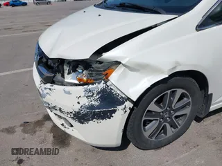2016 Honda Odyssey Touring Elite with VIN 5FNRL5H97GB044278, listed as a IAAI auction lot 42056101 with 182,396 mi miles and . Bid and sale history available at DreamBid. Image 6.