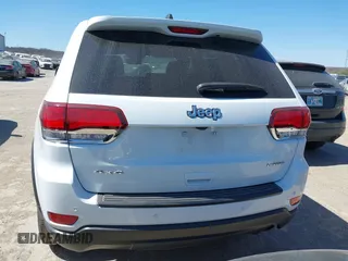 2021 Jeep Grand Cherokee Laredo E with VIN 1C4RJFAG5MC579865, listed as a IAAI auction lot 41818874 with 105,489 mi miles and . Bid and sale history available at DreamBid. Image 16.