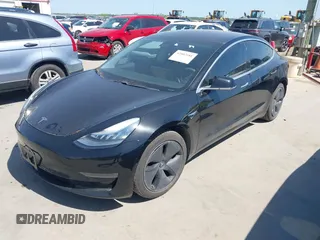 2018 Tesla Model 3 Long Range Battery with VIN 5YJ3E1EA7JF098632, listed as a IAAI auction lot 42002181 with 73,371 mi miles and . Bid and sale history available at DreamBid. Image 21.