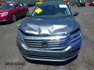 2021 Volkswagen Passat SE with VIN 1VWSA7A39MC011507, listed as a IAAI auction lot 42160879 with 82,639 mi miles and . Bid and sale history available at DreamBid. Image 6.