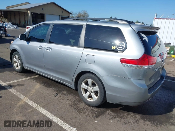 2011 Toyota Sienna LE AAS with VIN 5TDKK3DC7BS154584, listed as a IAAI auction lot 42013919 with 155,071 mi miles and . Bid and sale history available at DreamBid. Image 3.