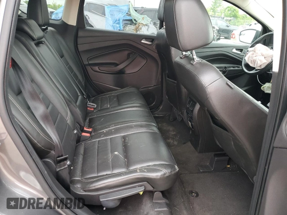 2013 Ford Escape SE с VIN 1FMCU9GX4DUA96010, выставлен на аукционе Copart как лот 57591945 с пробегом 162 760 миль миль и Списание • Salvage title. История ставок и продаж доступна на DreamBid. Изображение 11.
