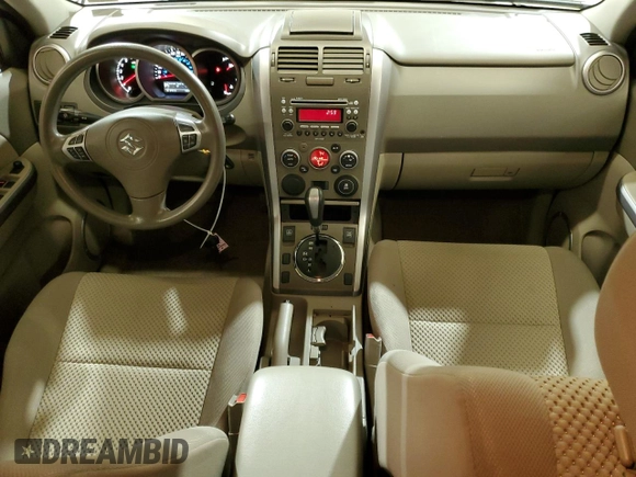 2012 Suzuki Grand Vitara Premium z VIN JS3TD0D66C4100845, wystawiony jako Copart lot #53454565 z przebiegiem 106 415 mil mil oraz Szkoda całkowita • Salvage title. Historia ofert i sprzedaży dostępna na DreamBid. Obrazek 8.