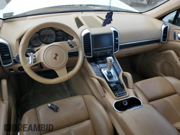 2012 Porsche Cayenne with VIN WP1AA2A23CLA02615, listed as a Copart auction lot 64604655 with 131,536 mi miles and Salvage title. Bid and sale history available at DreamBid. Image 8.