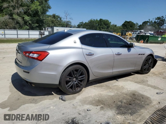 2015 Maserati Ghibli с VIN ZAM57XSA9F1154155, выставлен на аукционе Copart как лот 57093695 с пробегом 63 190 миль миль и Списание • Salvage title. История ставок и продаж доступна на DreamBid. Изображение 3.