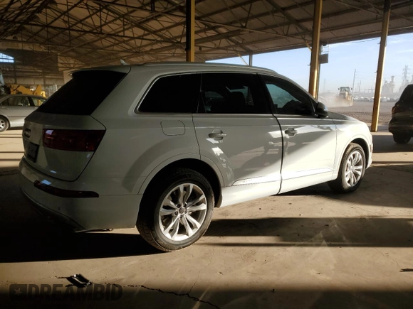 2019 Audi Q7 Premium with VIN WA1AAAF72KD003418, listed as a Copart auction lot 87104674 with 70,863 mi miles and Salvage title. Bid and sale history available at DreamBid. Image 3.