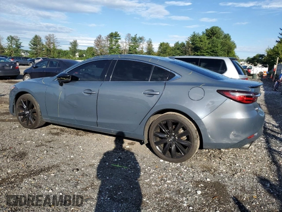 2021 Mazda 6 Grand Touring Reserve with VIN JM1GL1WY3M1602898, listed as a Copart auction lot 67871314 with 104,679 mi miles and Salvage Title. Bid and sale history available at DreamBid. Image 2.