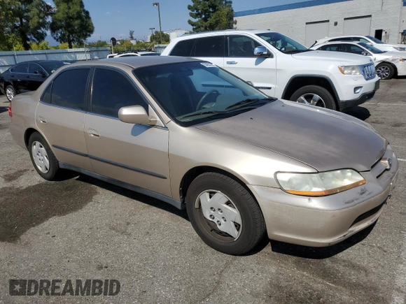 2000 Honda Accord LX z VIN 1HGCG1643YA089899, wystawiony jako Copart lot #54937555 z przebiegiem 196 596 mil mil oraz Szkoda całkowita • Salvage title. Historia ofert i sprzedaży dostępna na DreamBid. Obrazek 4.