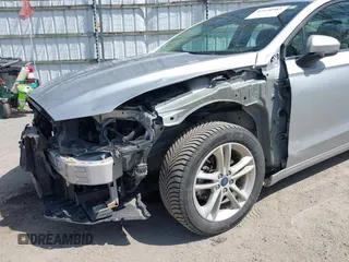 2018 Ford Fusion SE z VIN 3FA6P0H77JR226390, wystawiony jako IAAI lot #42120981 z przebiegiem 114 057 mil mil oraz . Historia ofert i sprzedaży dostępna na DreamBid. Obrazek 6.