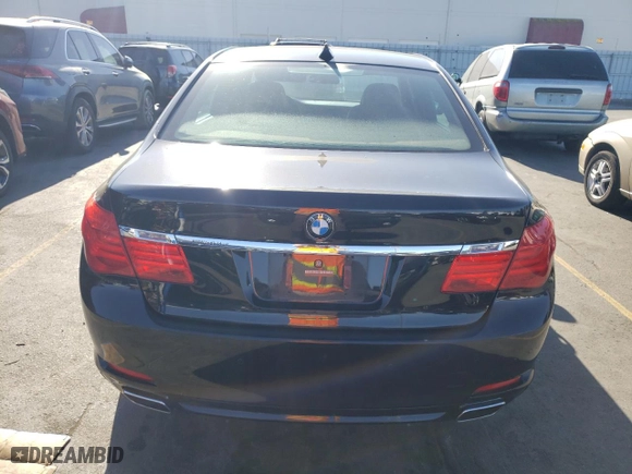 2011 BMW 7 Series 750Li with VIN WBAKB8C52BCY66628, listed as a Copart auction lot 77191054 with 39,503 mi miles and Salvage Title. Bid and sale history available at carsss.com. Image 6.