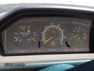 1991 Mercedes-Benz 300 with VIN WDBEA30D1MB497396, listed as a Copart auction lot 55834195 with 179,323 mi miles and Salvage Title. Bid and sale history available at carsss.com. Image 9.