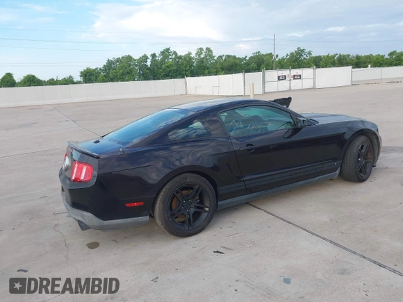 2012 Ford Mustang Premium with VIN 1ZVBP8AM5C5230822, listed as a IAAI auction lot 42647776 with 136,049 mi miles and . Bid and sale history available at DreamBid. Image 4.