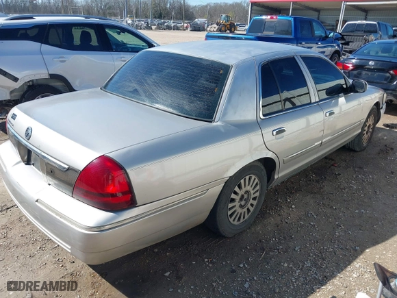 2007 Mercury Grand Marquis LS with VIN 2MEFM75V77X601170, listed as a IAAI auction lot 41517369 with 210,800 mi miles. Bid and sale history available at carsss.com. Image 4.