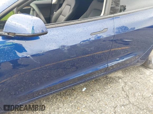 2023 Tesla Model 3 with VIN 5YJ3E1EA0PF518983, listed as a IAAI auction lot 41749225 with 26,748 mi miles and . Bid and sale history available at DreamBid. Image 12.