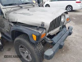 2005 Jeep Wrangler X with VIN 1J4FA39S55P350696, listed as a IAAI auction lot 42367283 with 117,941 mi miles and . Bid and sale history available at DreamBid. Image 6.