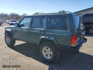 2000 Jeep Cherokee Police with VIN 1J4FF48S6YL115440, listed as a Copart auction lot 80316044 with 221,830 mi miles and Salvage Title. Bid and sale history available at carsss.com. Image 2.