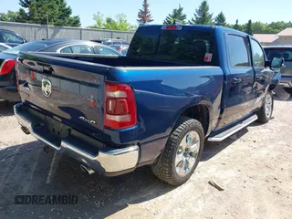 2021 Ram 1500 Big Horn with VIN 1C6SRFFT9MN665028, listed as a IAAI auction lot 42638933 with 71,929 mi miles and . Bid and sale history available at DreamBid. Image 4.