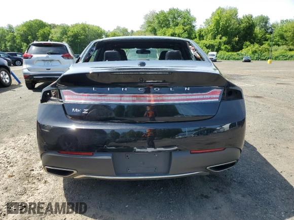2019 Lincoln MKZ Reserve II z VIN 3LN6L5E90KR607021, wystawiony jako Copart lot #57874945 z przebiegiem 71 061 mil mil oraz Szkoda całkowita • Salvage title. Historia ofert i sprzedaży dostępna na DreamBid. Obrazek 6.