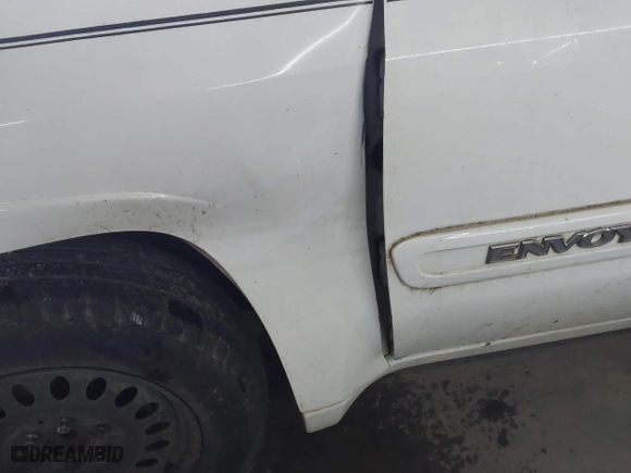 2004 GMC Envoy SLE with VIN 1GKDS13S642118163, listed as a IAAI auction lot 41809472 with 234,353 mi miles. Bid and sale history available at carsss.com. Image 6.