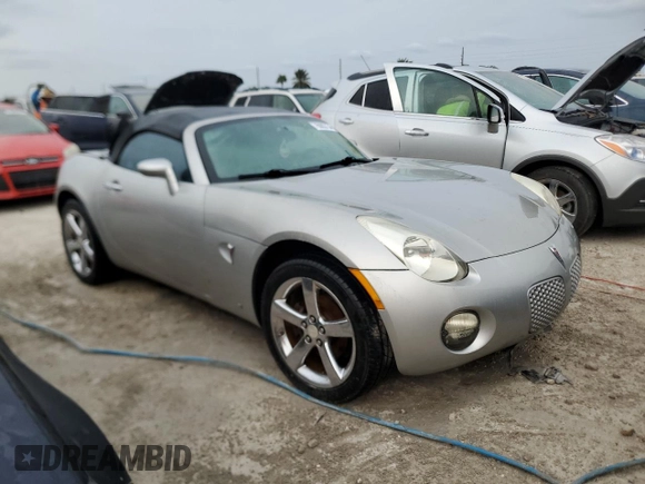 2009 Pontiac Solstice z VIN 1G2MN35B59Y107109, wystawiony jako Copart lot #76083734 z przebiegiem Nie podano mil oraz Nie do naprawy • Non repairable. Historia ofert i sprzedaży dostępna na DreamBid. Obrazek 4.