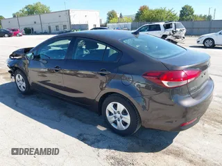 2018 Kia Forte LX with VIN 3KPFK4A70JE217385, listed as a IAAI auction lot 39955381 with 99,060 mi miles. Bid and sale history available at carsss.com. Image 3.