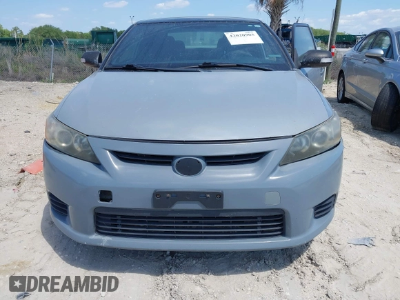 2012 Scion tC with VIN JTKJF5C79C3043661, listed as a IAAI auction lot 42020903 with 184,891 mi miles. Bid and sale history available at carsss.com. Image 13.