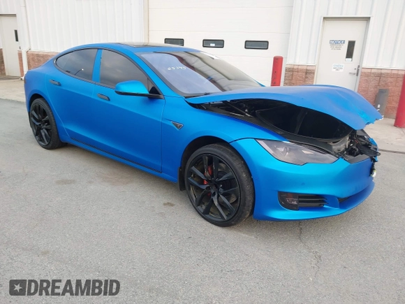 2013 Tesla Model S Performance with VIN 5YJSA1DP5DFP25345, listed as a IAAI auction lot 42288379 with 165,915 mi miles and . Bid and sale history available at DreamBid. Image 1.