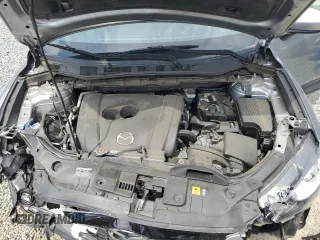 2014 Mazda CX-5 Grand Touring with VIN JM3KE4DY9E0416967, listed as a Copart auction lot 54215285 with 77,296 mi miles and Salvage Title. Bid and sale history available at DreamBid. Image 11.