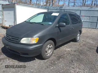2003 Toyota Sienna LE with VIN 4T3ZF13C93U539976, listed as a IAAI auction lot 41921369 with 280,815 mi miles. Bid and sale history available at carsss.com. Image 2.