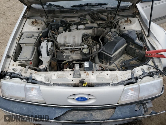 1991 Ford Taurus with VIN 1FACP52U9MG101093, listed as a Copart auction lot 45948105 with 594,696 mi miles and Salvage title. Bid and sale history available at DreamBid. Image 11.