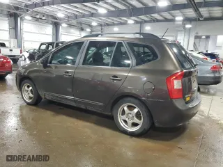 2009 Kia Rondo LX Base with VIN KNAFG528397269679, listed as a Copart auction lot 64802864 with 160,936 mi miles and Salvage Title. Bid and sale history available at carsss.com. Image 2.