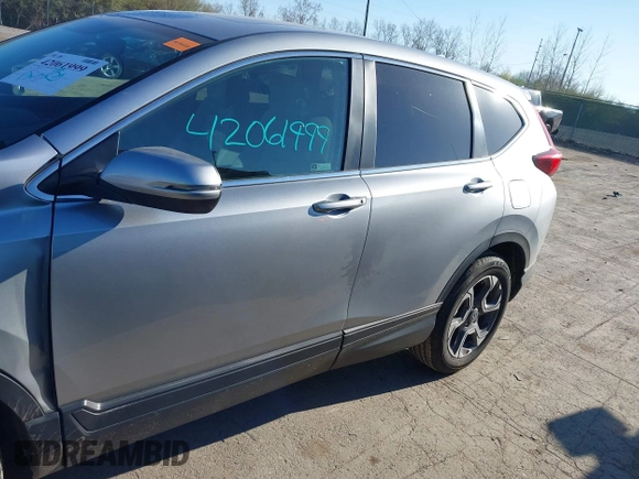 2018 Honda CR-V EX with VIN 7FARW2H56JE097214, listed as a IAAI auction lot 42061999 with 74,862 mi miles and . Bid and sale history available at DreamBid. Image 15.