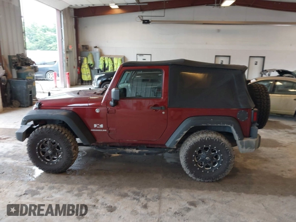 2009 Jeep Wrangler X with VIN 1J4FA24169L756377, listed as a IAAI auction lot 42718401 with 161,565 mi miles and . Bid and sale history available at DreamBid. Image 14.