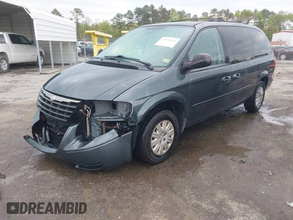 2006 Chrysler Town & Country LX with VIN 2A4GP44R96R615942, listed as a IAAI auction lot 42039452 with 158,009 mi miles and . Bid and sale history available at DreamBid. Image 17.