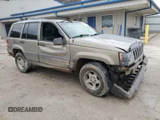 1996 Jeep Grand Cherokee Laredo with VIN 1J4GZ58Y5TC378100, listed as a Copart auction lot 85493724 with 0 mi miles and Salvage Title. Bid and sale history available at carsss.com. Image 4.