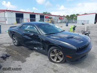 2018 Dodge Challenger SXT with VIN 2C3CDZAG5JH311460, listed as a IAAI auction lot 40176844 with 94,761 mi miles. Bid and sale history available at carsss.com. Image 1.