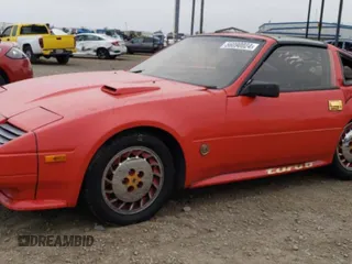 1984 Nissan 300ZX z VIN JN1CZ14SXEX009648, wystawiony jako Copart lot #56090024 z przebiegiem 48 776 mil mil oraz Szkody całkowita. Historia ofert i sprzedaży dostępna na DreamBid. Obrazek 1.